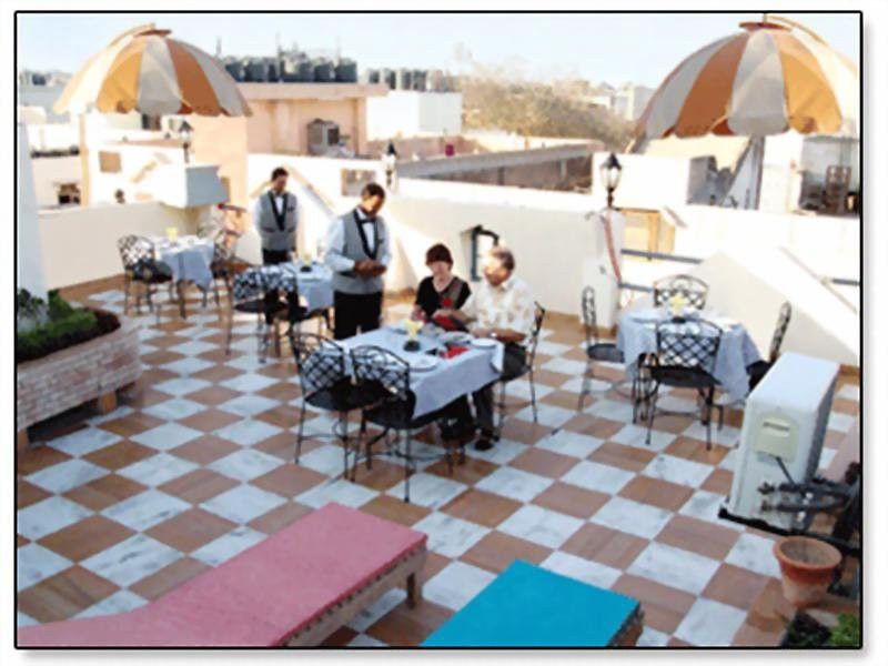 דלהי Hotel Sunstar Grand מסעדה תמונה